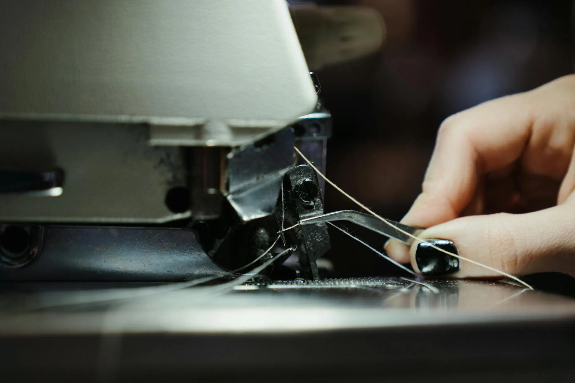 Sewing machine and thread — expert tailoring at Wonderful Alteration Store